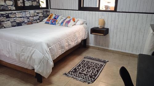 Ένα ή περισσότερα κρεβάτια σε δωμάτιο στο Hyperrent habitaciones