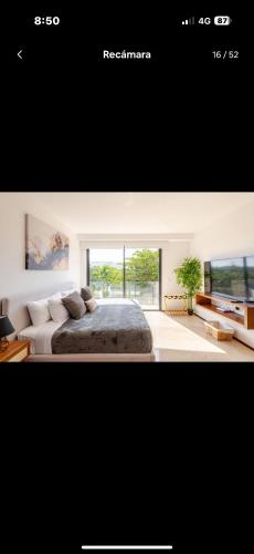 Ένα ή περισσότερα κρεβάτια σε δωμάτιο στο Meneses tulum