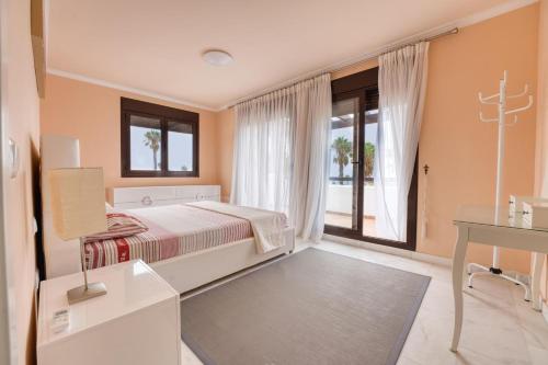 Ένα ή περισσότερα κρεβάτια σε δωμάτιο στο Spacious Villa Laurisilva
