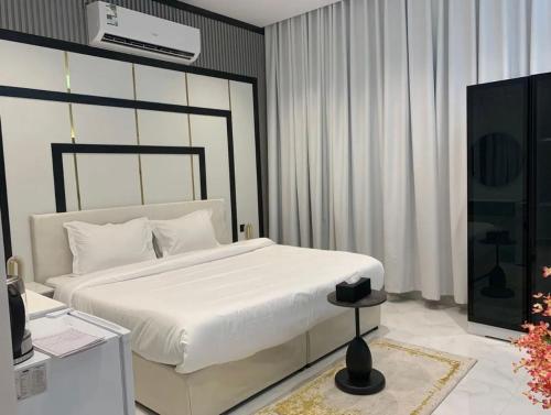 Ένα ή περισσότερα κρεβάτια σε δωμάτιο στο البروفيسور