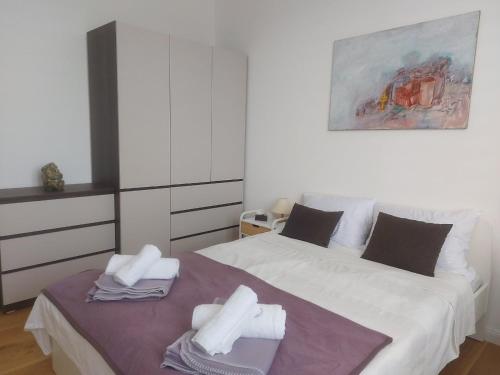 Ένα ή περισσότερα κρεβάτια σε δωμάτιο στο Kilenc Danube District 8