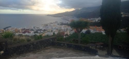 a view of a city from a hill with the ocean at El Sueño Del Angel in Santa Cruz de la Palma