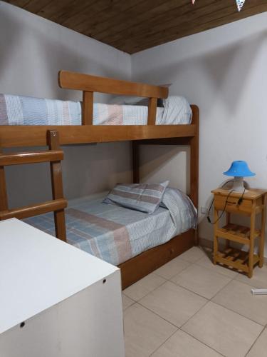 Ένα ή περισσότερα κρεβάτια σε δωμάτιο στο Peumayen Nueva Atlantis