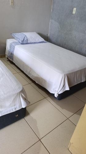 Ένα ή περισσότερα κρεβάτια σε δωμάτιο στο La casita del fondo