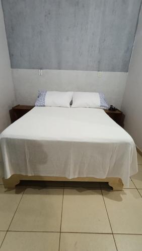 Ένα ή περισσότερα κρεβάτια σε δωμάτιο στο La casita del fondo