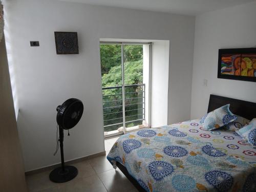 Ένα ή περισσότερα κρεβάτια σε δωμάτιο στο Apartamento Melgar - Altagracia