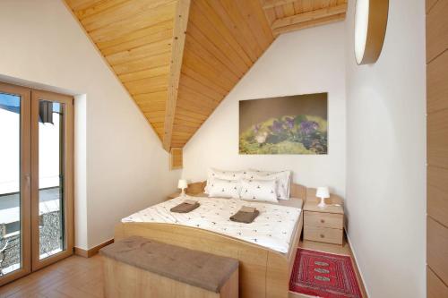 Ένα ή περισσότερα κρεβάτια σε δωμάτιο στο Komforna planinska kuća za odmor