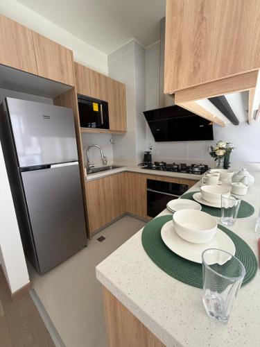 Η κουζίνα ή μικρή κουζίνα στο Depa en Pleno FIDEL ANZE con Parqueo Pet-Friendly