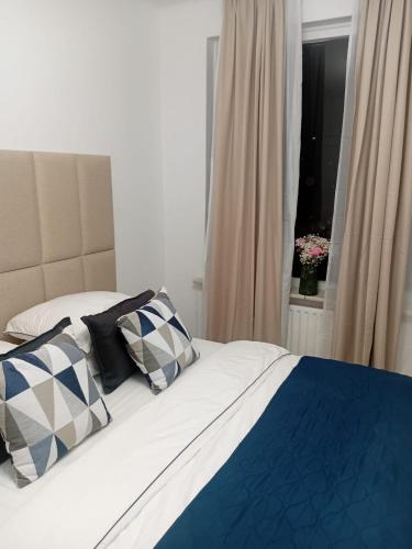 Ένα ή περισσότερα κρεβάτια σε δωμάτιο στο Bright and quiet apartment in Zeist Centrum