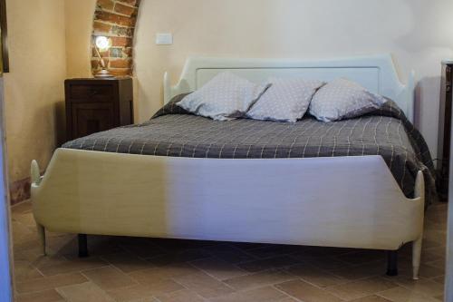 Postel nebo postele na pokoji v ubytování Il Bosco Agriturismo