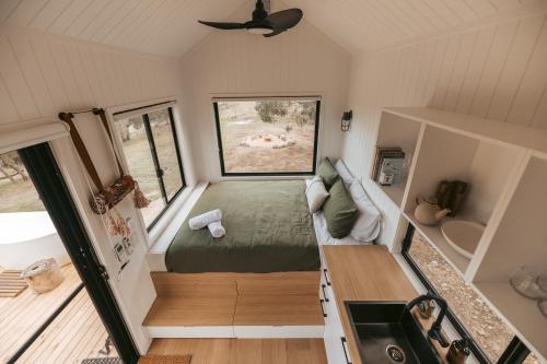 a small bedroom in a tiny house at Tiny Ikigai in Wallan