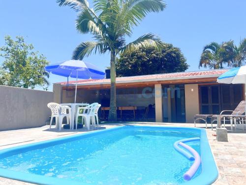 Πισίνα στο ή κοντά στο Recanto da Palmeira - Piscina aquecida, quartos com ar condicionado