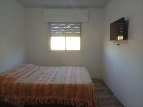 Ένα ή περισσότερα κρεβάτια σε δωμάτιο στο Gaia Miramar - sea and nature