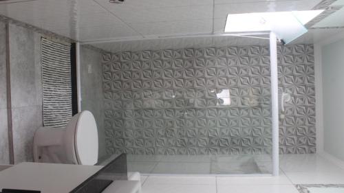 Phòng tắm tại Casa perto da praia a 5 minutos