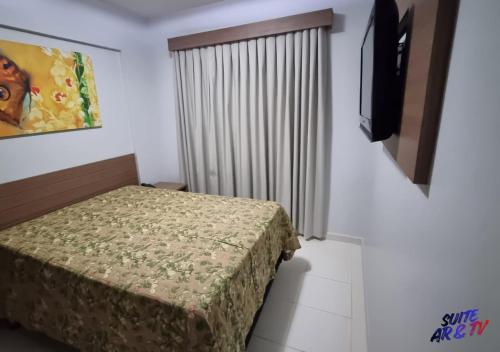 En eller flere senge i et værelse på Flat Veredas do Rio Quente 709