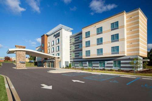 a rendering of a building with an empty parking lot at Fairfield Inn & Suites by Marriott Greenville Spartanburg/Duncan in Duncan