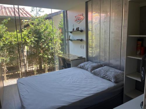 Ένα ή περισσότερα κρεβάτια σε δωμάτιο στο Casa container