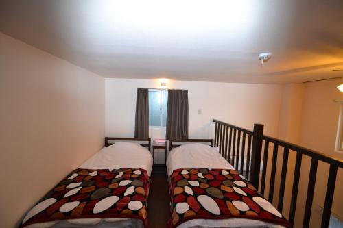 Ένα ή περισσότερα κρεβάτια σε δωμάτιο στο Aparthotel Palais Royal with Parking