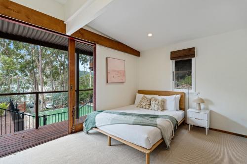 Ένα ή περισσότερα κρεβάτια σε δωμάτιο στο The Tree House, Cottage Point - Back to Nature