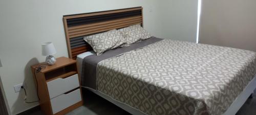 Giường trong phòng chung tại Apto 52 Lomas