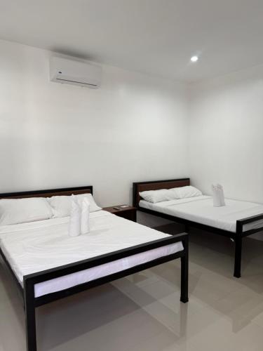 Ένα ή περισσότερα κρεβάτια σε δωμάτιο στο harveys apartment