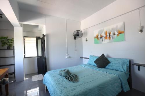 Postel nebo postele na pokoji v ubytování Funky Crab The River