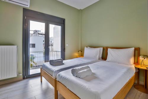 Modern 2BD Apt Behind Athens Tower by Live&Travel