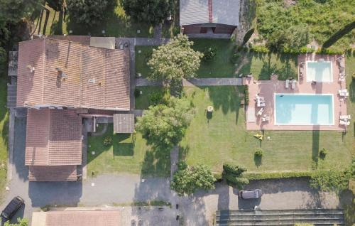an overhead view of a house with a yard at Villa Magnolia in Grosseto