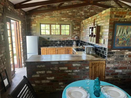 Η κουζίνα ή μικρή κουζίνα στο Vallombrosa Cottage