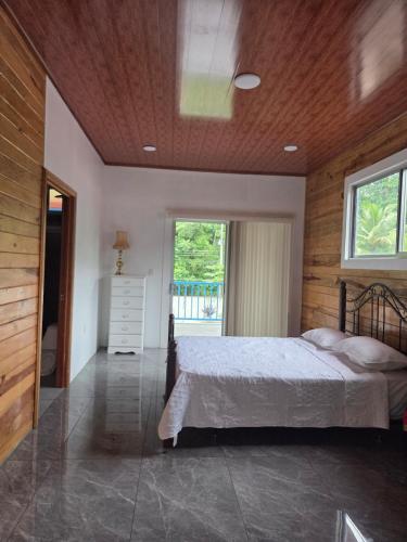 Un pat sau paturi într-o cameră la Casa Langostino