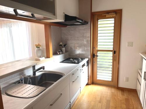 Η κουζίνα ή μικρή κουζίνα στο Cozy House Azumino