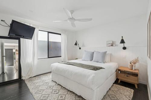 Ένα ή περισσότερα κρεβάτια σε δωμάτιο στο Donovan's Guest House - Foodies, Pet Friendly