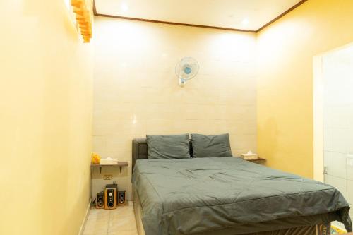 Ένα ή περισσότερα κρεβάτια σε δωμάτιο στο Villa Kubu Gitgit