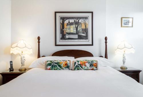 Postel nebo postele na pokoji v ubytování Lodging at Goose Cove