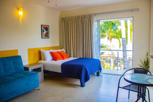 Postel nebo postele na pokoji v ubytování Hotel Majo Sayulita