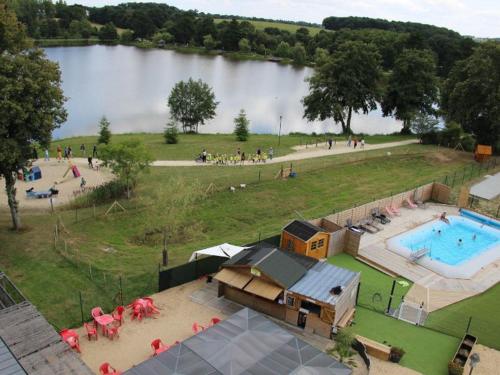 an aerial view of a park with a swimming pool at Mobil-home cosy avec terrasse à Loudéac - API-1-52-1116 in Loudéac