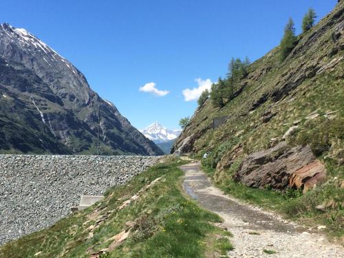 a dirt road on the side of a mountain at Chalet Stadel in Saas-Grund