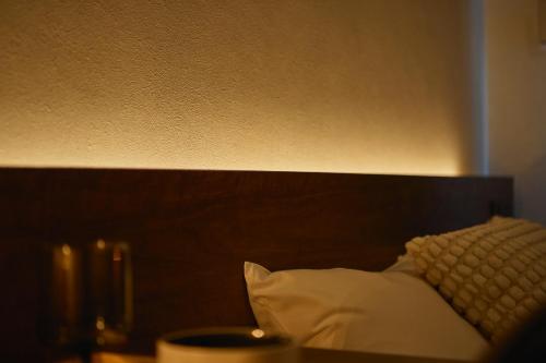 Ένα ή περισσότερα κρεβάτια σε δωμάτιο στο Residence Hotel Hakata 3