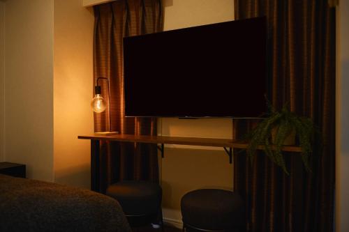 Μια τηλεόραση ή/και κέντρο ψυχαγωγίας στο Residence Hotel Hakata 3