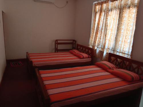 Ένα ή περισσότερα κρεβάτια σε δωμάτιο στο Country Cottage