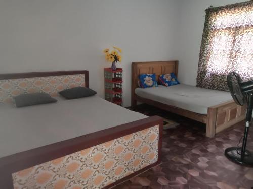 Ένα ή περισσότερα κρεβάτια σε δωμάτιο στο Shyami Villa