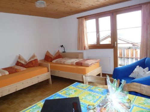 Un pat sau paturi într-o cameră la Ferienwohnung Stoffel