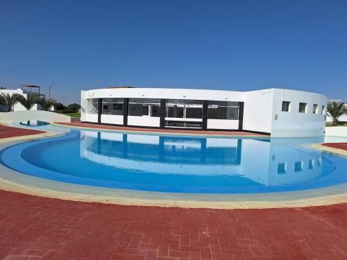 Swimmingpoolen hos eller tæt på Paracas Exclusivo Departamento familiar