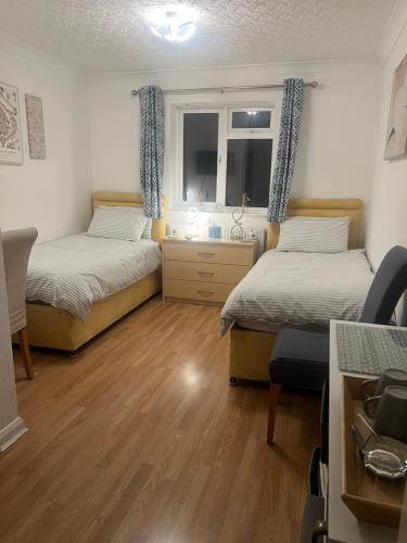 Postel nebo postele na pokoji v ubytování The Bungalow by SJP - Twin Room