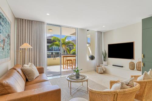 Μια τηλεόραση ή/και κέντρο ψυχαγωγίας στο Casuarina Drift - Stylish Santai Studio by uHoliday
