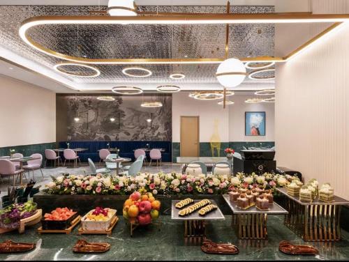 Fotografie z fotogalerie ubytování 郑州东站万象城酒店 v destinaci Xingzhuang