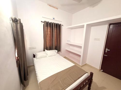 Ένα ή περισσότερα κρεβάτια σε δωμάτιο στο AETERNA Homestay