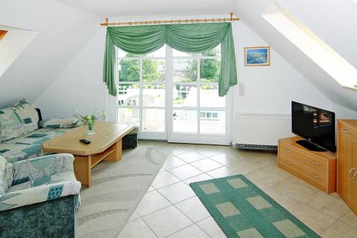 TV a/nebo společenská místnost v ubytování Apartments Jeske, Altenkirchen