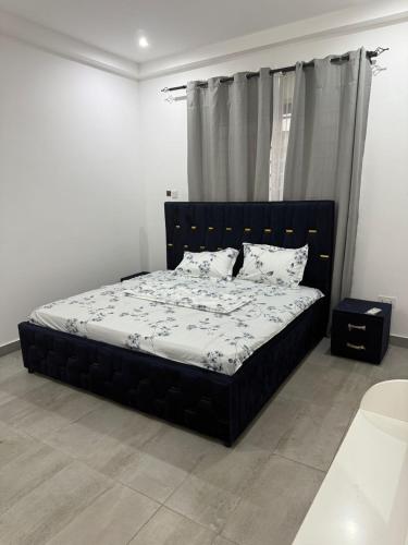 Llit o llits en una habitació de Cozykeys Haven