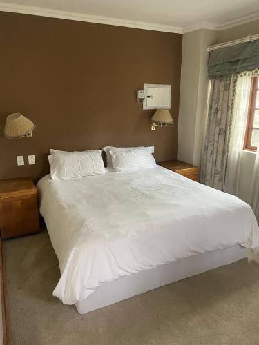 Giường trong phòng chung tại Cottage apartment